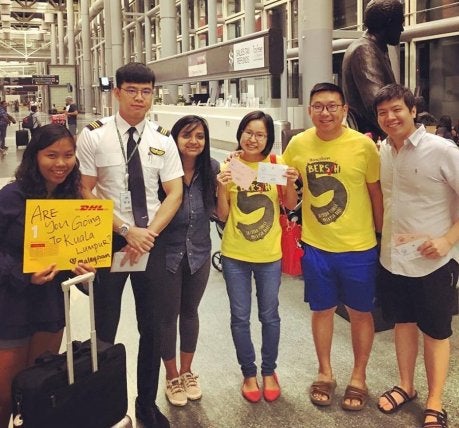 Malaysians In Houston Passed Their Ballots To A Pilot Returning Home To Vote. Credit Kristina Mariswamy