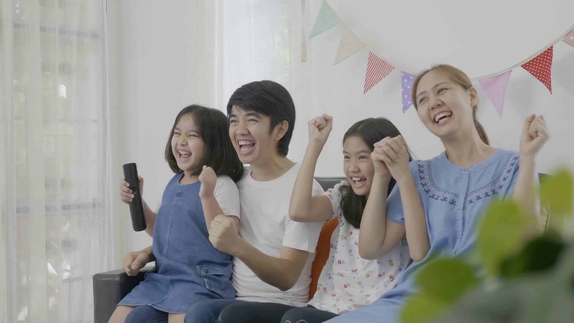 Videoblocks 4K Slow Motion Of Happy Asian Family Watching Exciting Movie Together Blh0Ejsx Thumbnail Full12