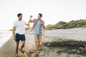 two friends walking beach 23 2147641423