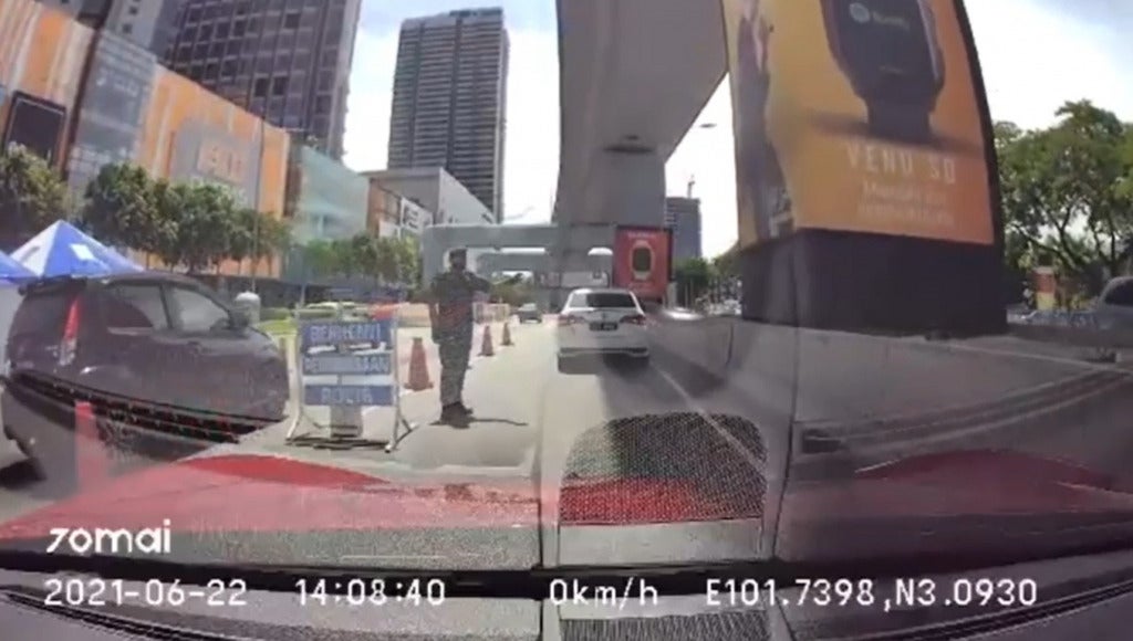 Dash cam footage of police roadblock in car