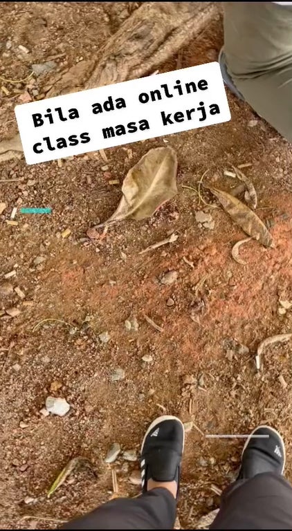 Foodpanda Rider Kneeling On Attend Online Class While Working