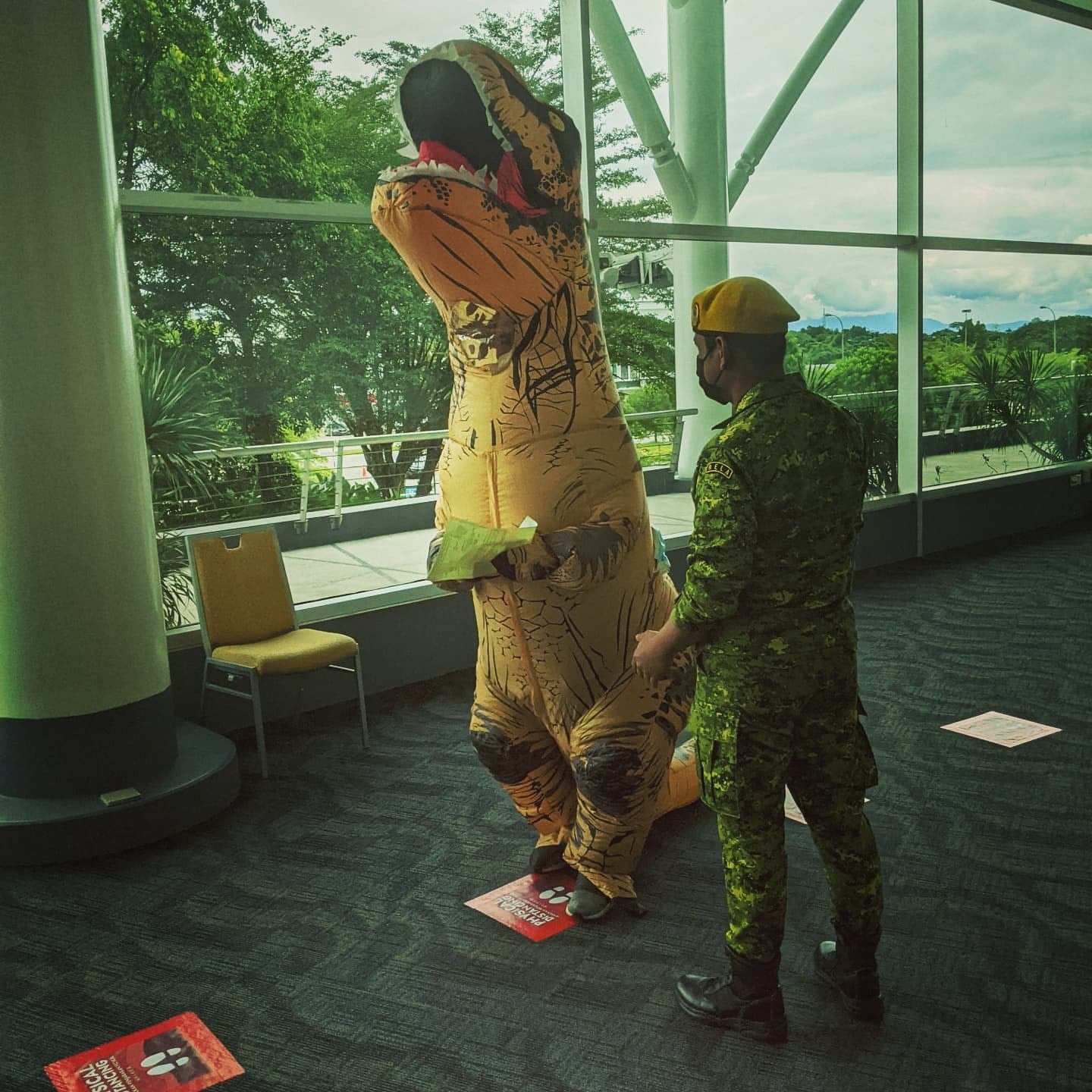 Man In Dinosaur Suit In Sarawak Vaccination Center