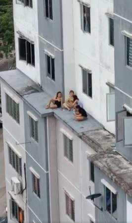 Woman Chilling At The Balcony