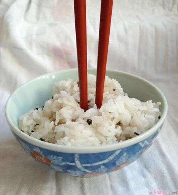 Chopstick In The Middle Of Rice Bowl