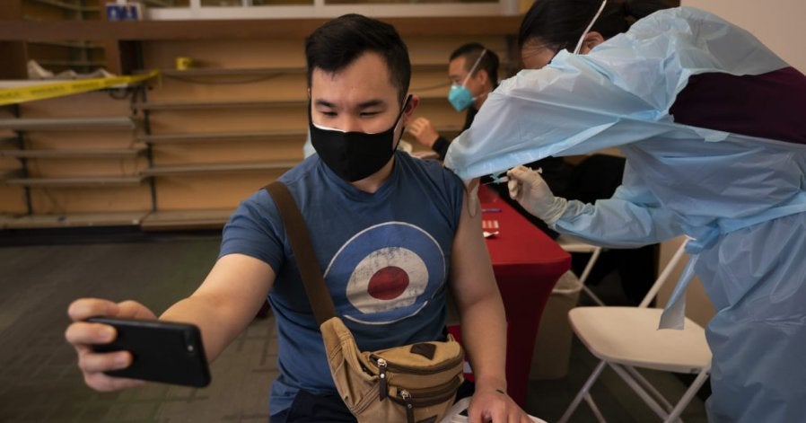 Man Taking Video When Taking Vaccination