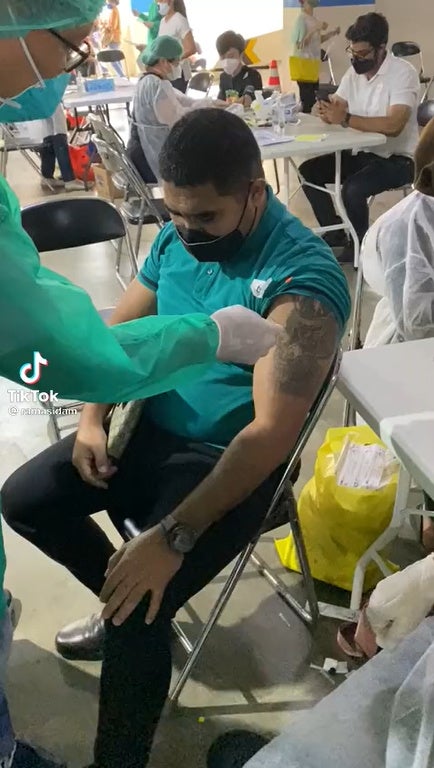 Tattoo Man Getting Vaccination 1