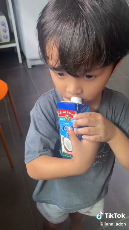 Ss 5 Kid Boy Drinking Coconut Milk