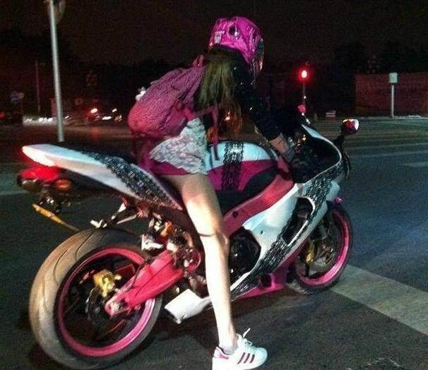 Girl Riding Motor At Night