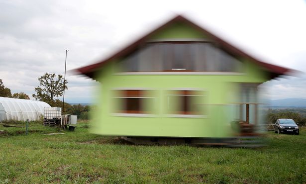 0 Vojin Kusic house is seen while rotating by electric motors and wheels from a military transporter i