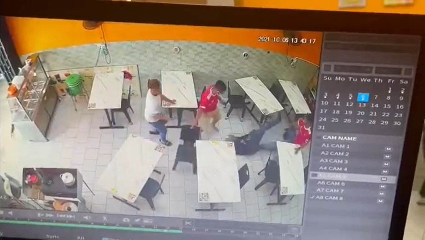 SS 4 man beats wife in restaurant