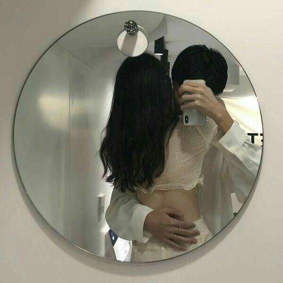 Couple Mirror Photo