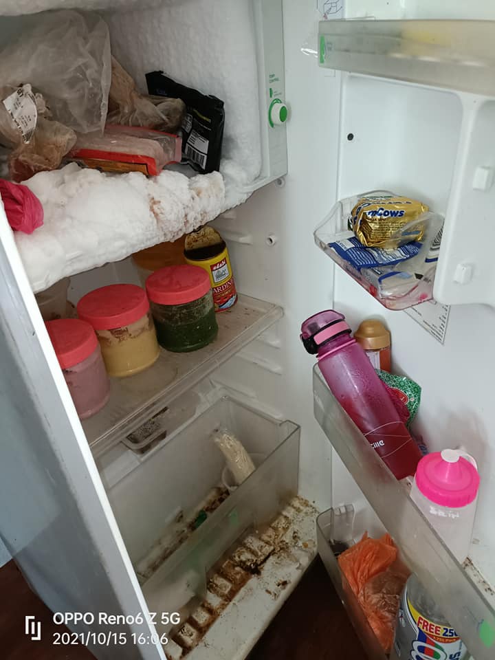 dirty kitchen in rented house fridge 4