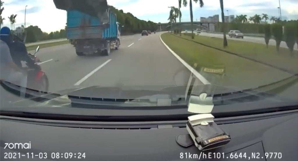 SS 2 lorry canvas fell off motorcycle accident