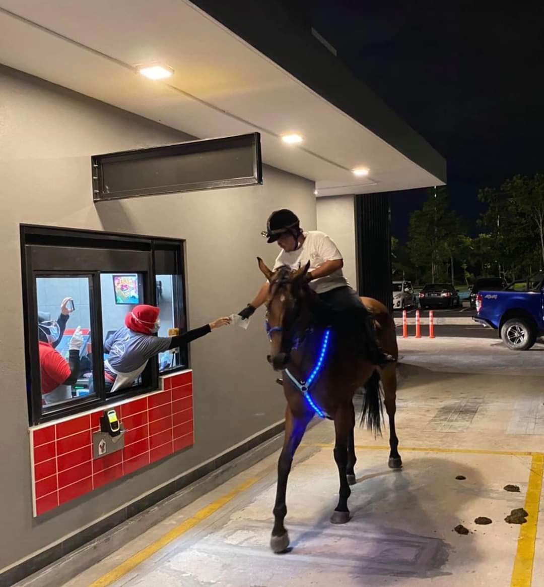 shit horse ride drive thru mcd mcdonalds cyberjaya malaysia