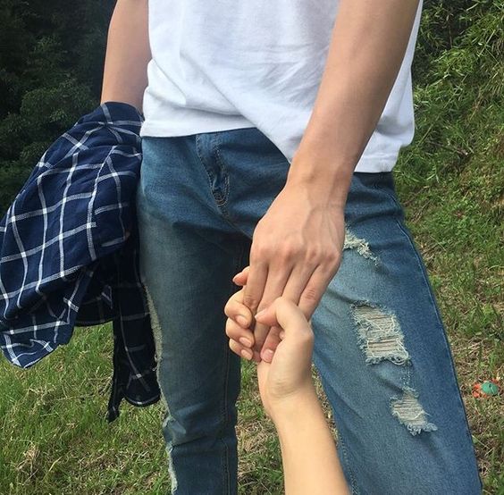 couple hold hand