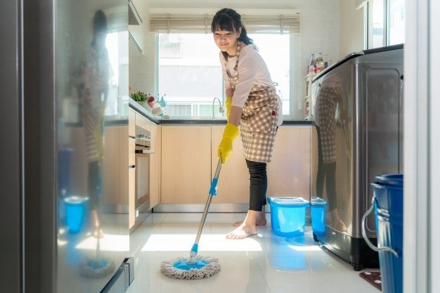 Maid Mopping Floor