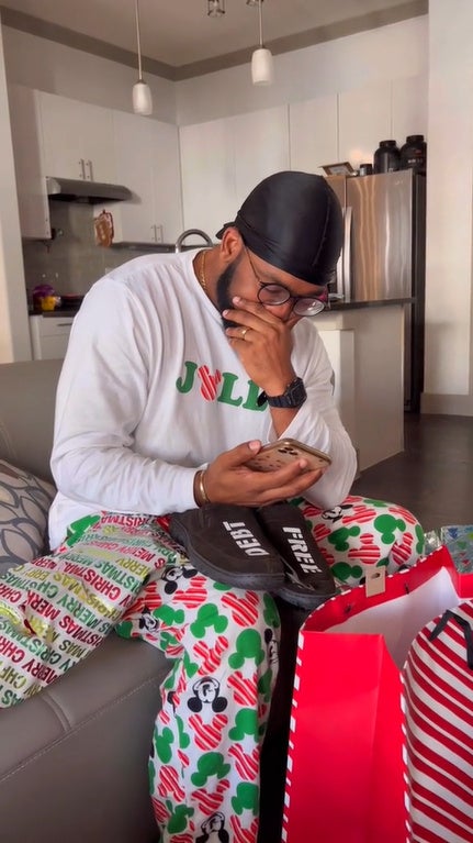 SS5 wife clears husband student loan for christmas present man unwrapping gift