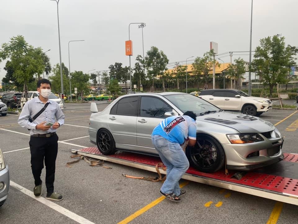 woman gifts mitsubishi sports car to boyfriend for valentines day