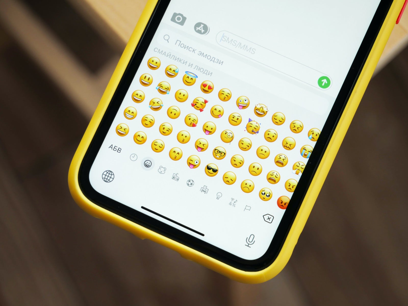 Denis Cherkashin Emoji On Phone Unsplash
