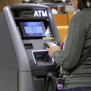 woman using atm