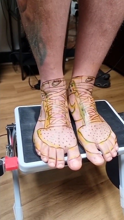 SS 1 Nike shoes tattoo on leg