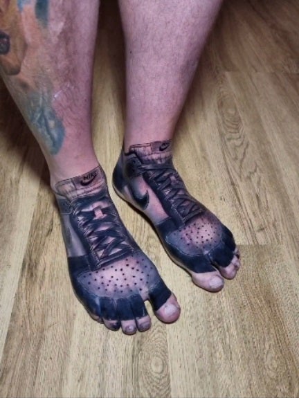 SS 2 Nike shoes tattoo on leg