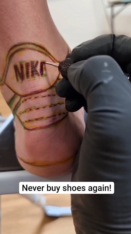 SS 6 Nike shoes tattoo on leg