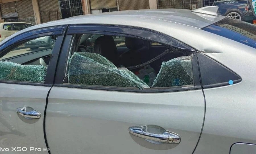 forklift bang car broken window