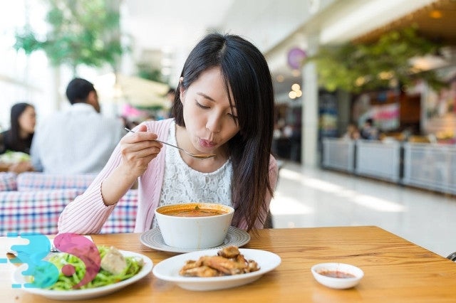 Girl Eating Curry