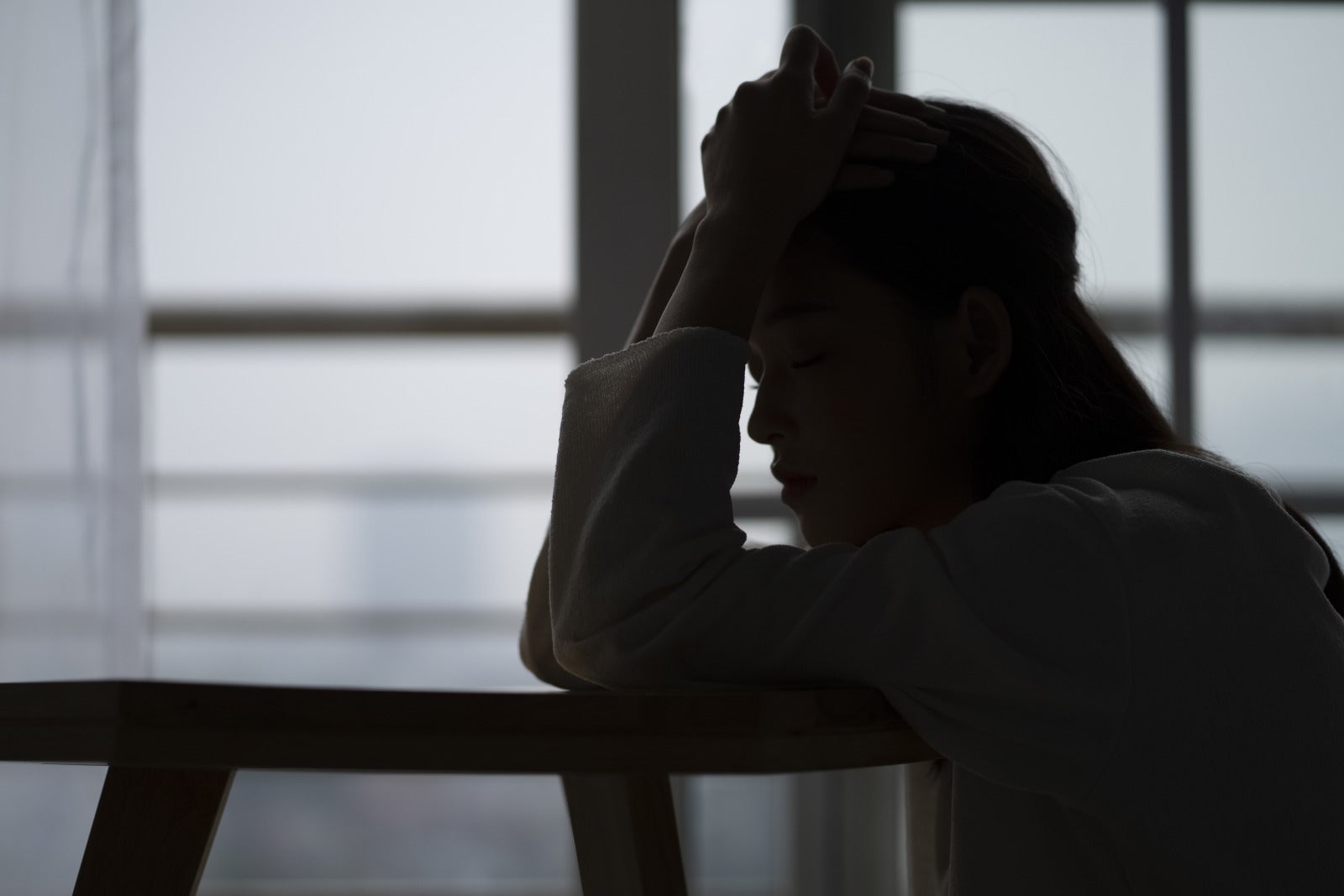 Young Woman Sad Lonely Dark In Room