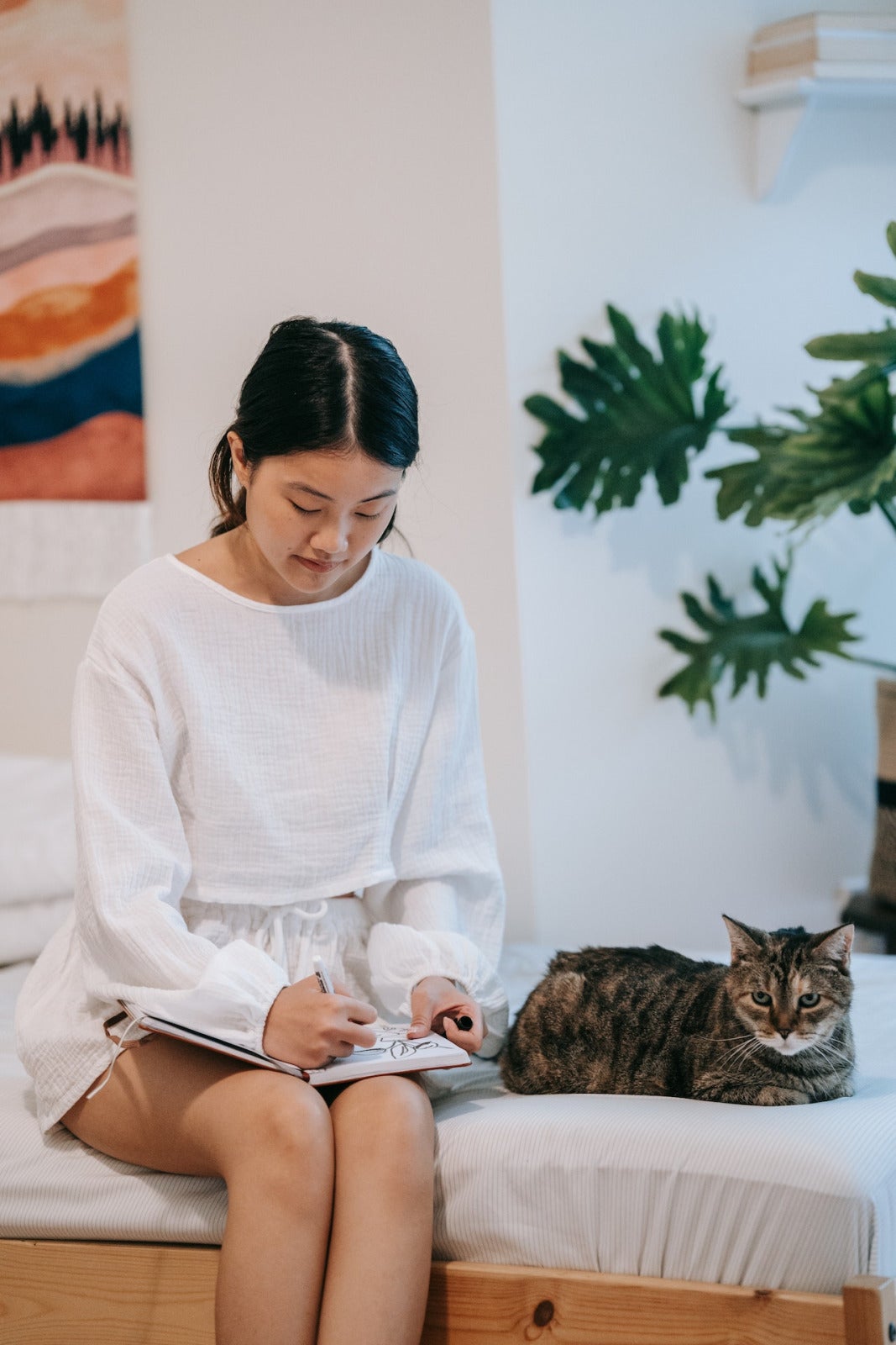Pexels Sasha Kim Woman And Cat Scaled