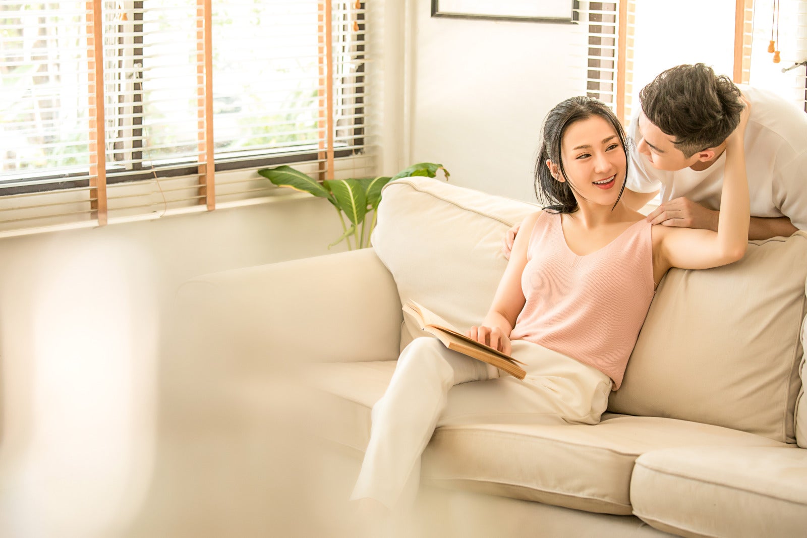 chinese asian couple living room happy