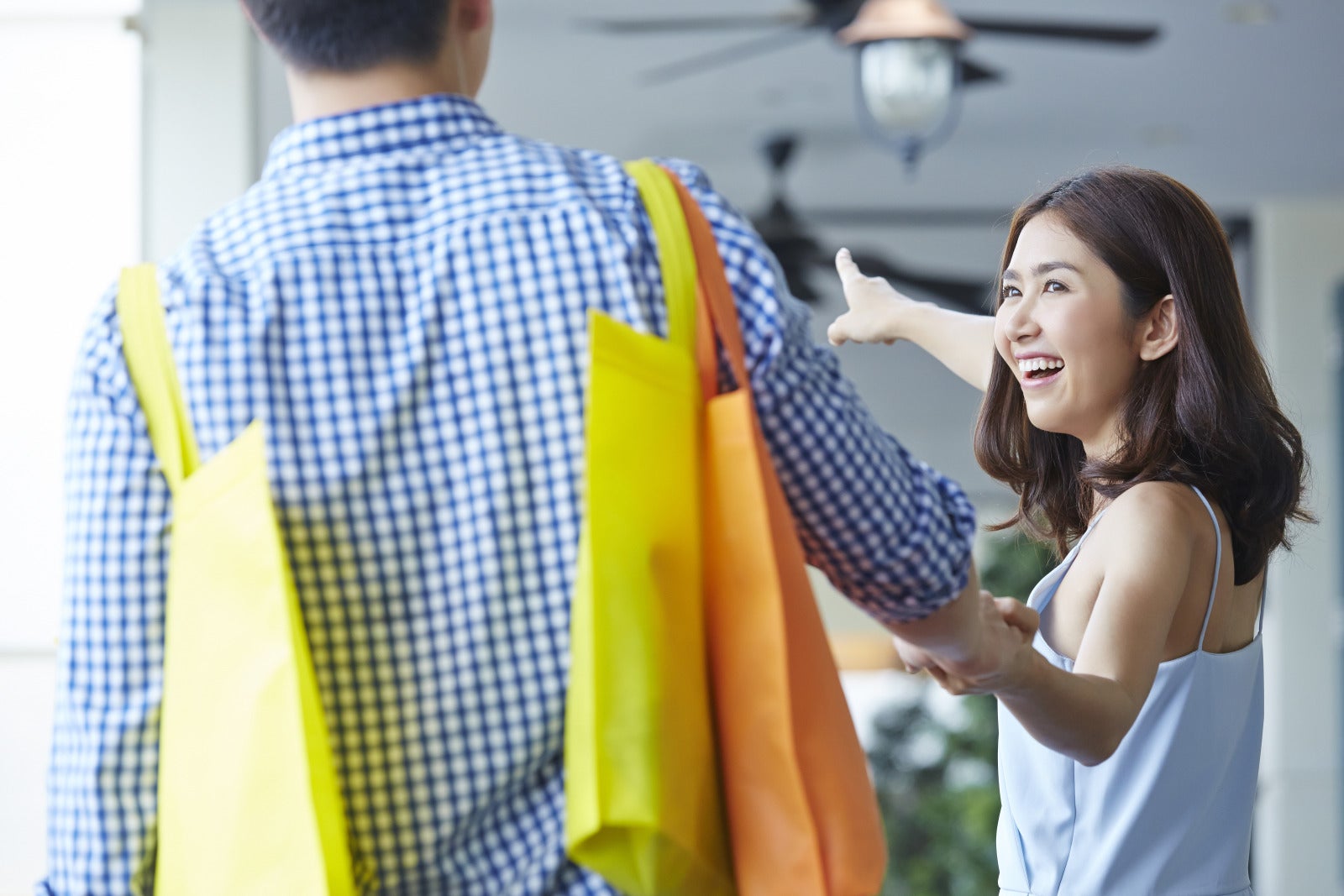 chinese asian couple shopping happy