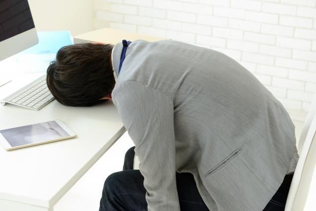 man lay on table sleeping dead