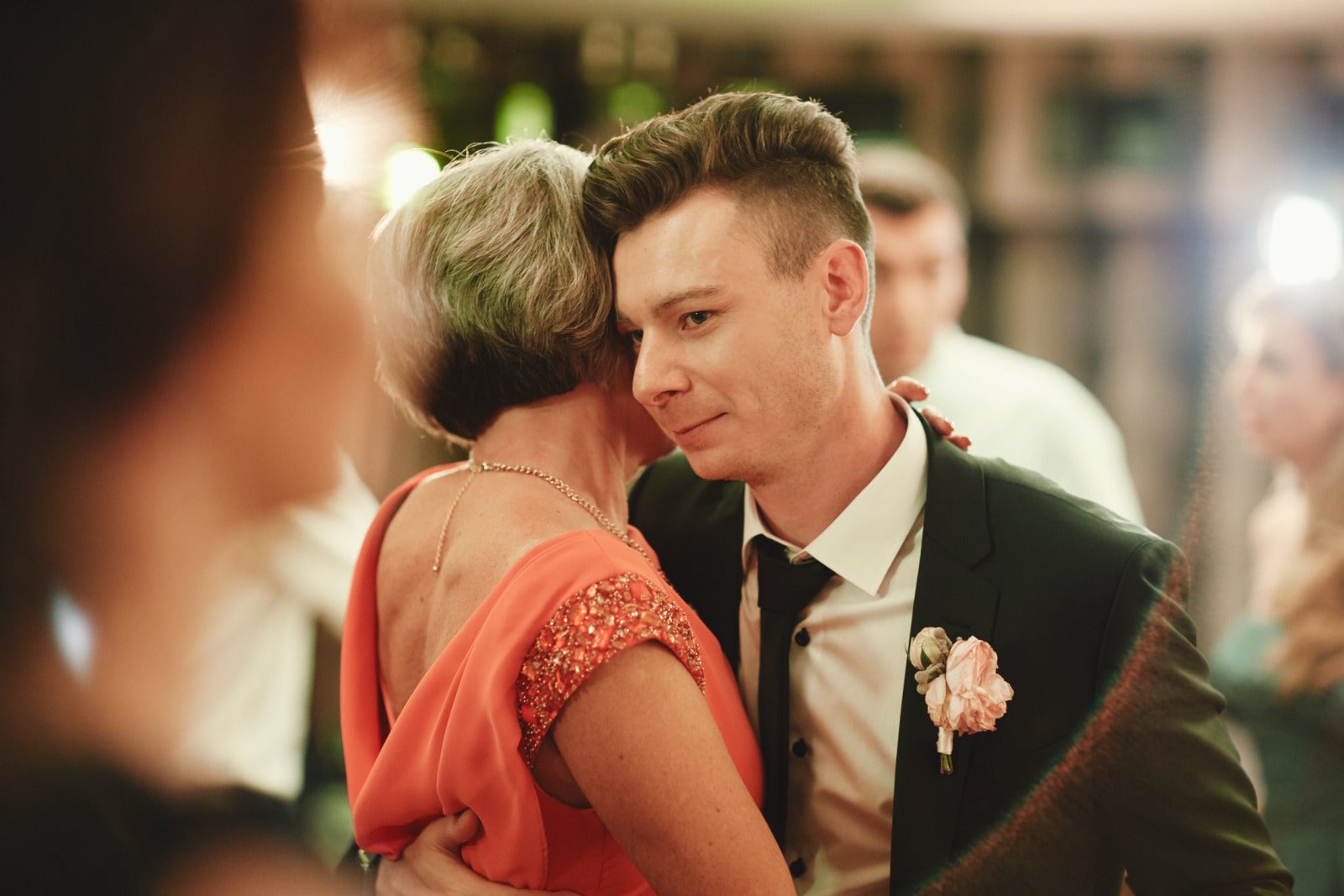 groom dancing wedding with mother