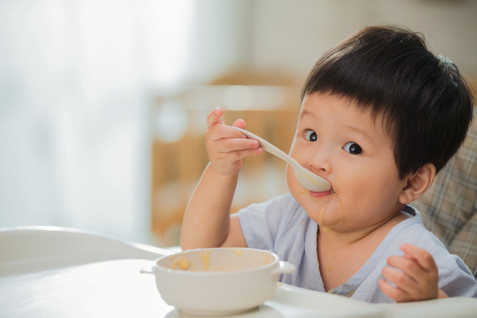 asian baby eating