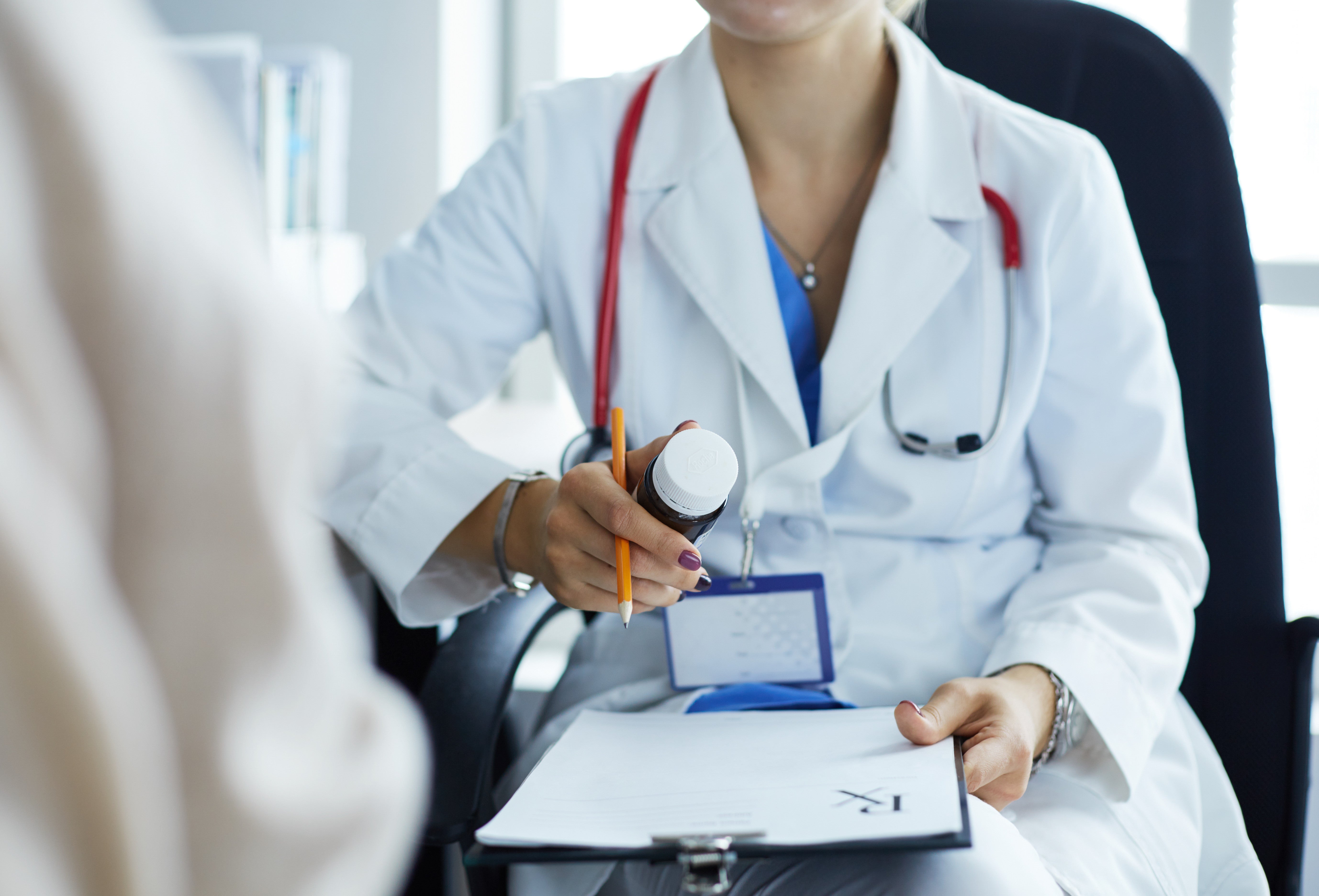 123Rf Female Doctor Explaining To Patient Medicine