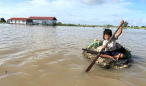 Governor Vows To Help Little Girl Forced To Paddle To School On Raft Made Of Garbage