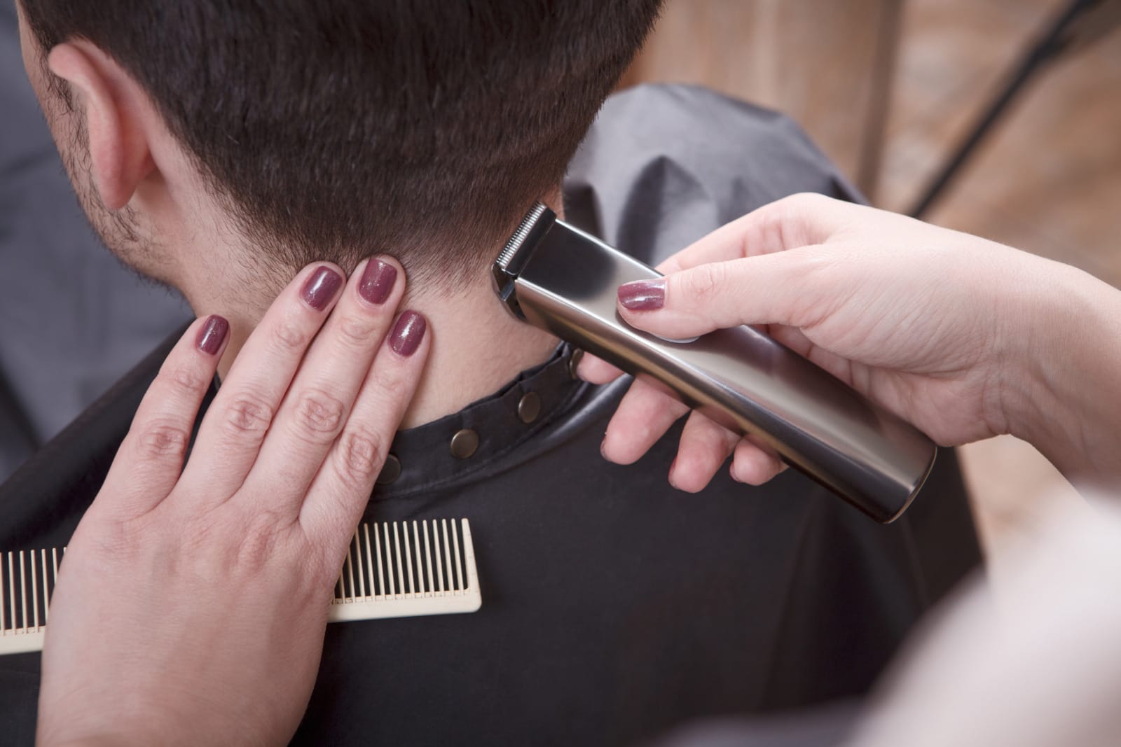123rf woman hand nails shaving cutting hair for man in saloon