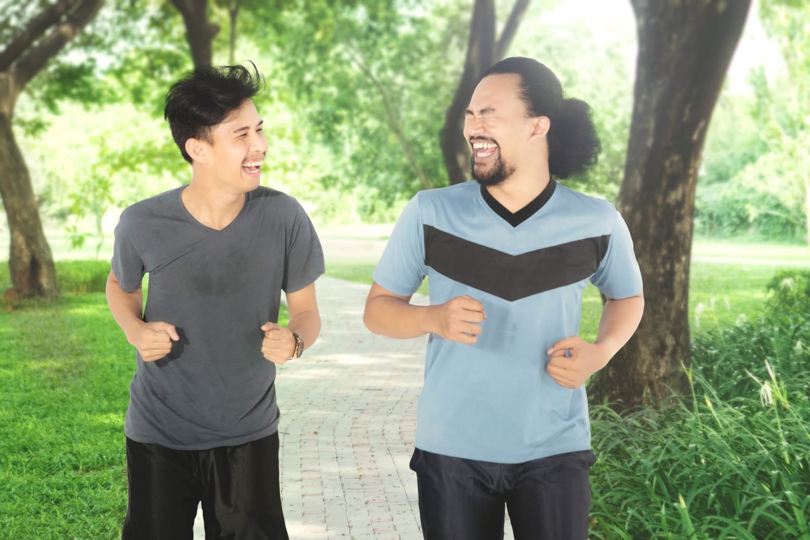 123rf asian young men jogging happy laughing in park