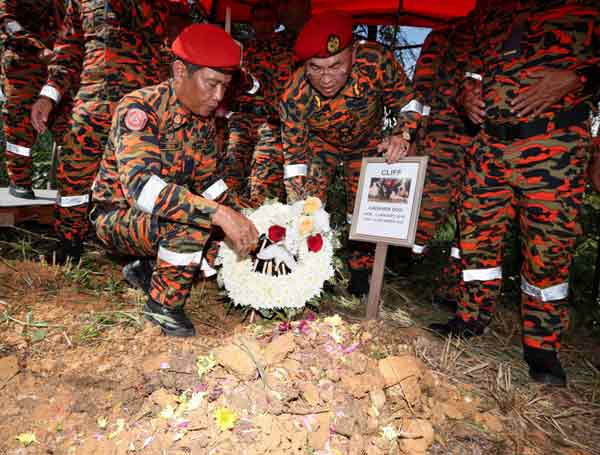 sarawak bomba cliff k9 dog cliff died burial flower