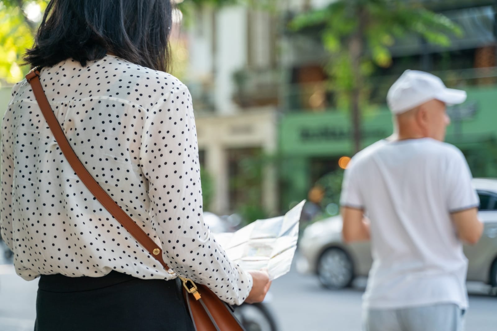 123rf young asian woman holding map travel