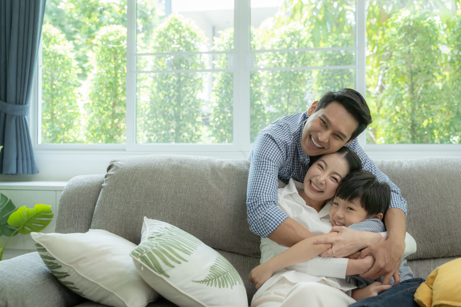 asian man woman kid son dad mum family home hugging together happy 123rf