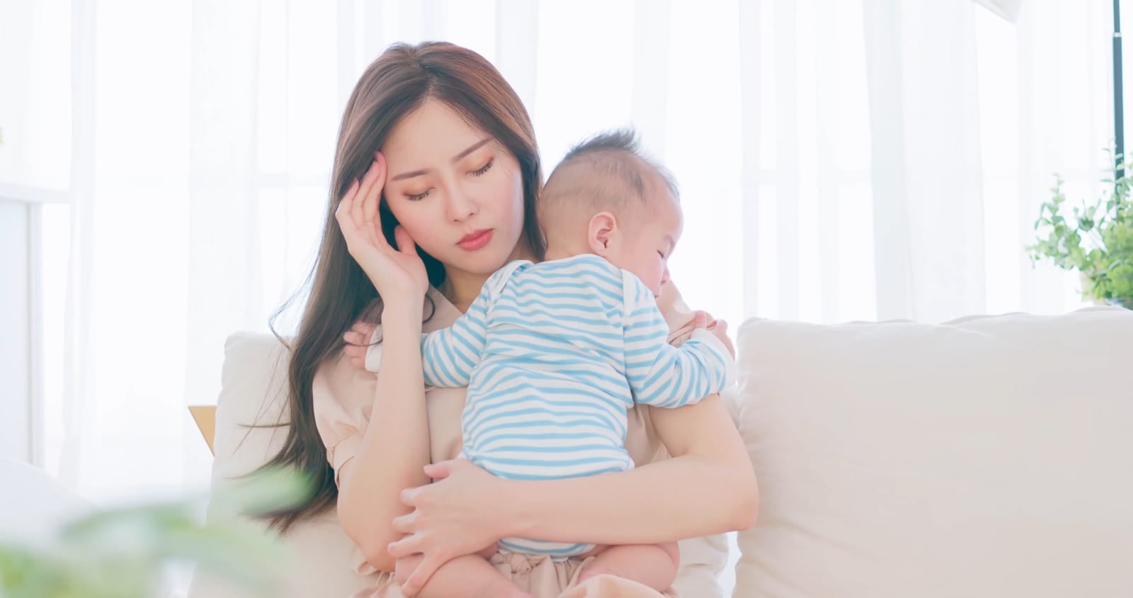 asian woman headache stressed taking care baby carry 123rf