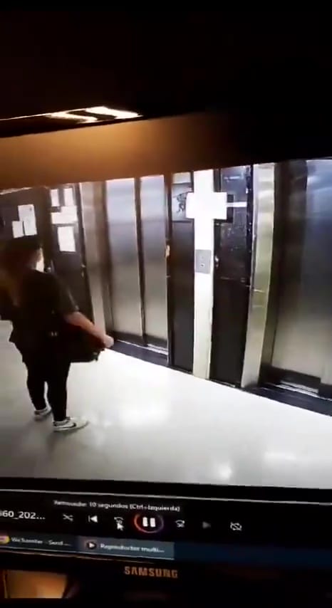 couple in lift stumbled waiting passerby 2