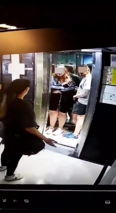 couple in lift stumbled waiting passerby 7