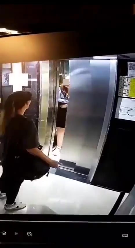 couple in lift stumbled waiting passerby 8