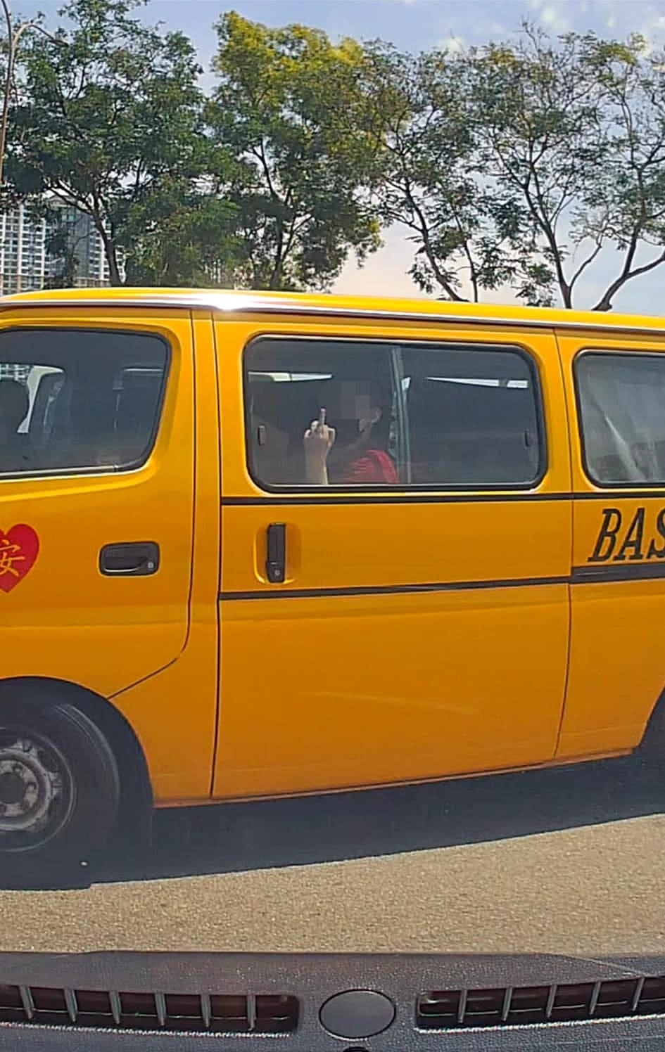 school student boy middle finger to driver 2