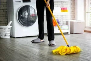depositphotos 396794560 stock photo housewife mopping floor woman using