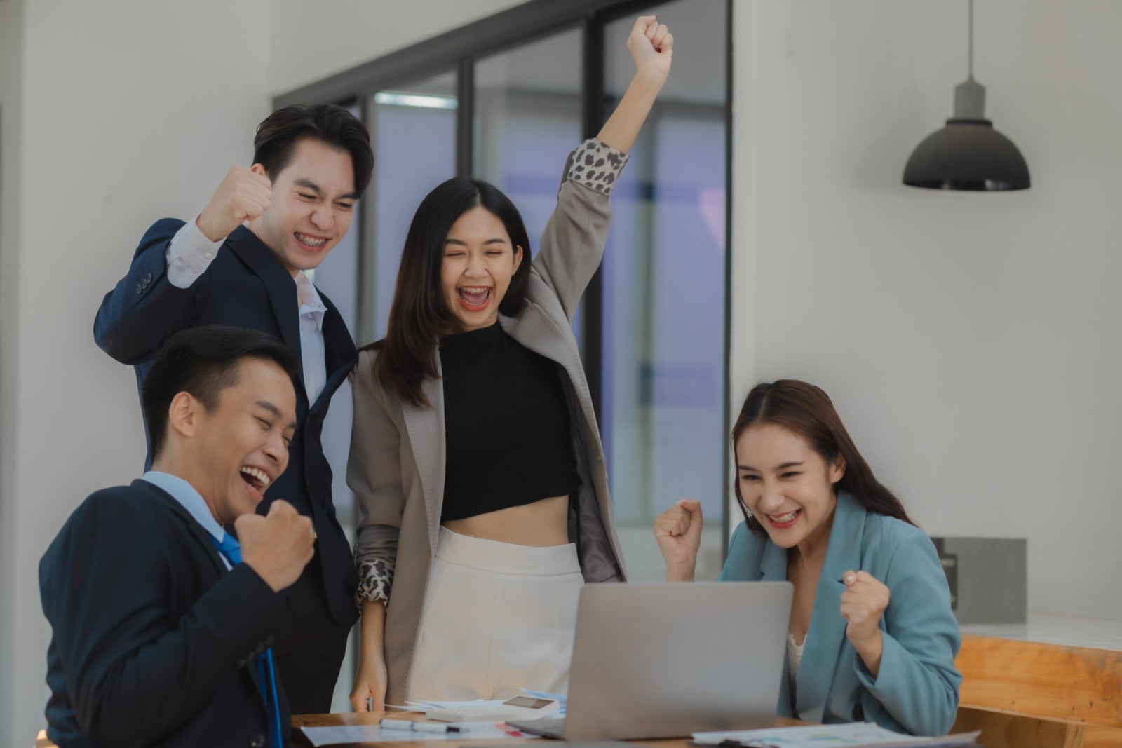 Happy Asian Employees Working Together Laughing Cheering 123Rf